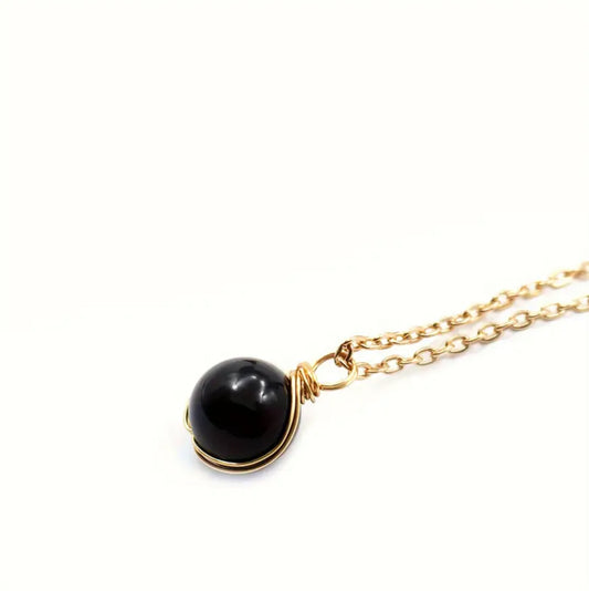 Collier Pendentif Onyx Noir – Force et Protection