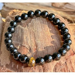 Bracelet en Onyx Noir avec perle d’Œil de Tigre – Ancrage & Force Intérieure