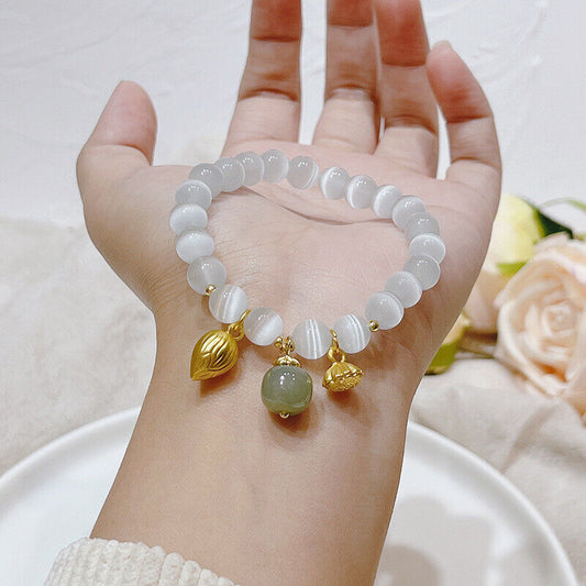 Bracelet en Œil de Chat Blanc et Jade – Lumière et Sérénité